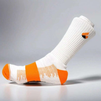 White and orange crew tennis sock with Active Arc compression, seamless toe, ankle protection, and sustainable bamboo yarn.